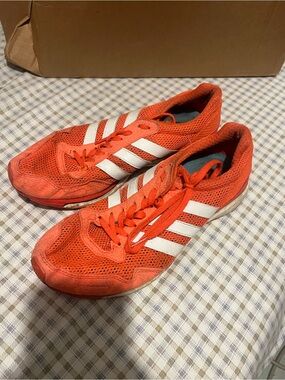 Continental Bright Orange Mesh Sneakers with White Stripes